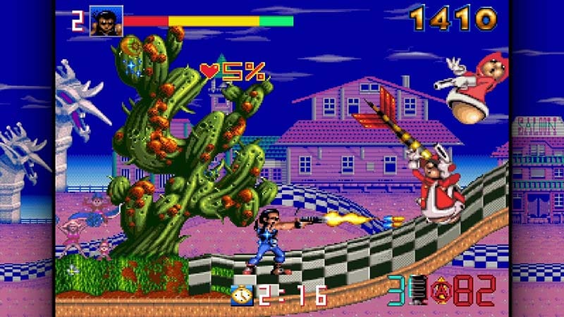 Side-scrolling gameplay scene with Inguz shooting through a toy-themed biomechanical stage
