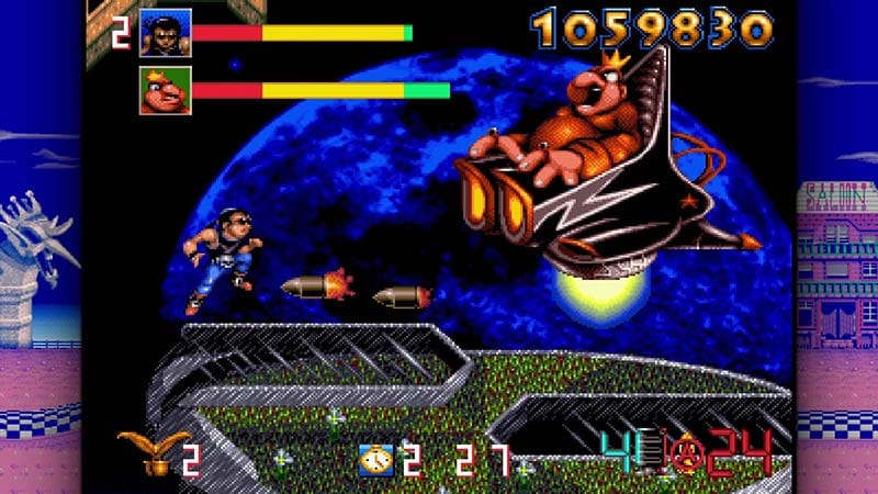 Boss fight encounter with a large toy-themed biomechanical enemy and attack patterns
