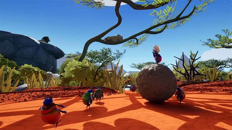 Gameplay scene showing dung beetles working together to roll a dung ball