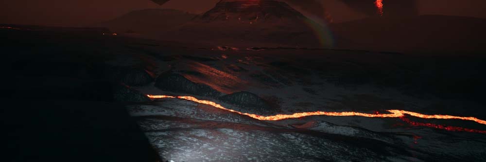 Wide alien landscape showing expansive procedural rally environment with distant checkpoints