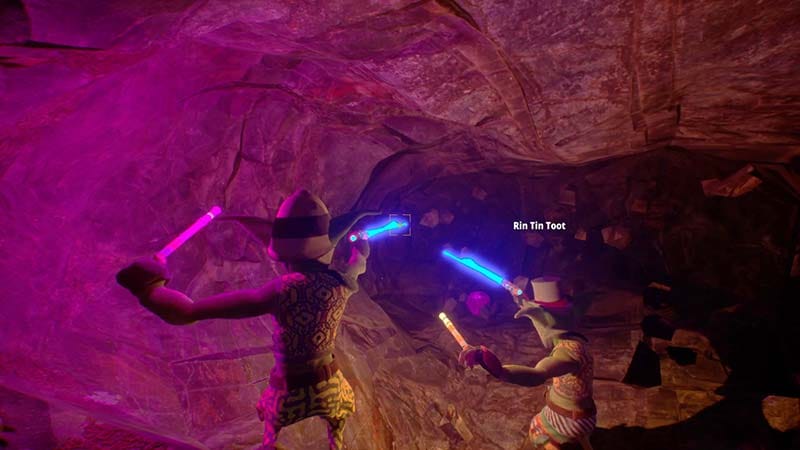 Underground exploration scene with torch lighting used to navigate dark cave areas