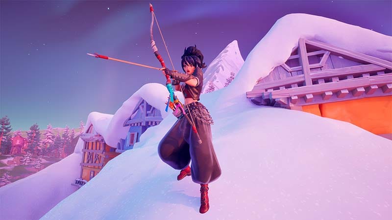 Wide gameplay scene showing a colorful arena during active combat