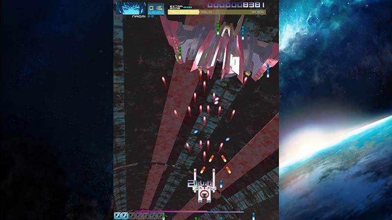 Arcade gameplay scene featuring boss encounter with complex attack patterns and scoring chains
