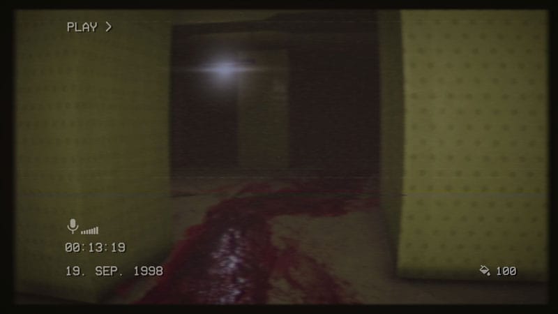 First-person stealth movement through narrow corridor in survival horror gameplay