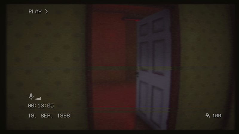 Player using spray tool to mark walls inside maze-like office environment