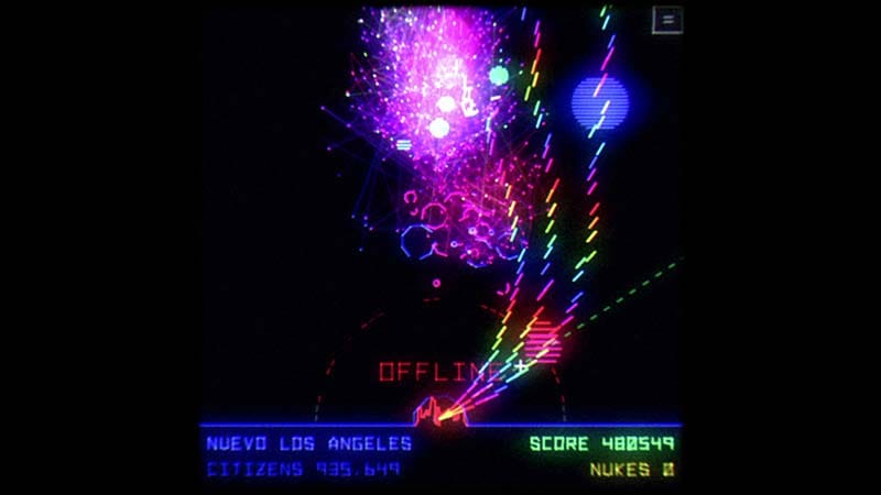 Gameplay view of a futuristic city surrounded by hostile attackers
